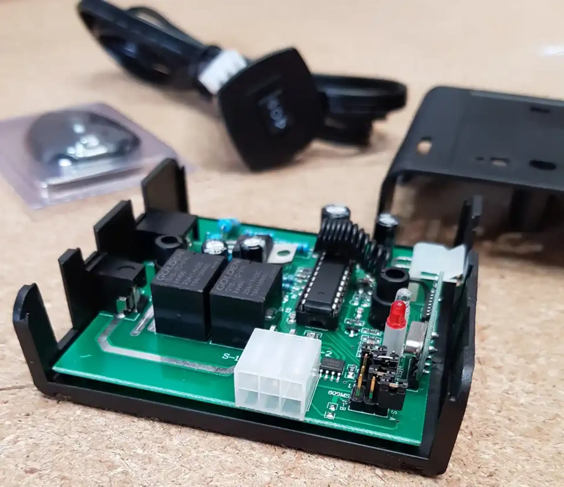 The inside of a Venset control box showing the PCB and electrical components